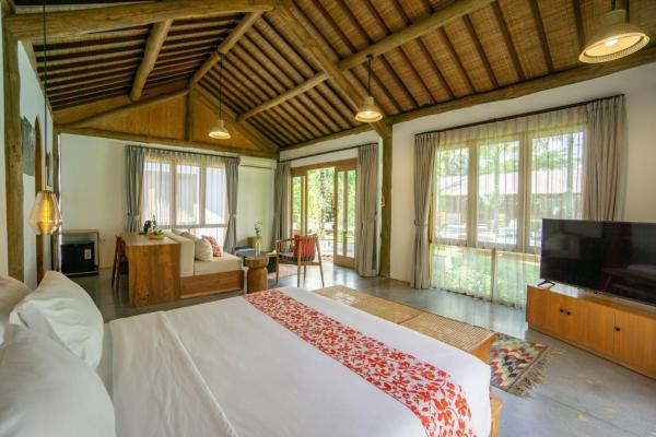 På billedet ses objektet Poolside Room with Lounge in Kaba-Kaba beliggende i byen Tabanan.