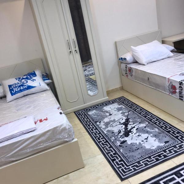 Na zdjęciu widoczny jest obiekt فندق رويال هوم położony w mieście Maḩallat al Burj.