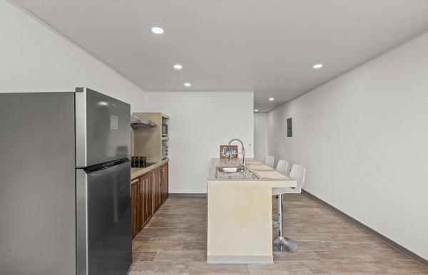 The photo shows the casa amor del sol apartment #1 located in the city of Quebrada Ganado.