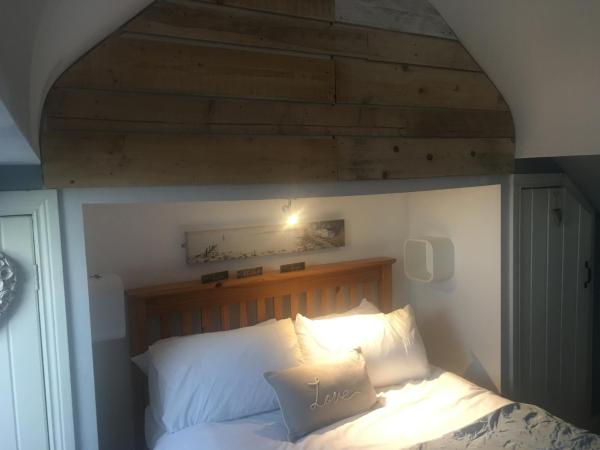 A la foto es mostra l'objecte Driftwood Loft situat a la ciutat de Crossgar.