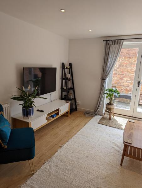 A la foto es mostra l'objecte Coach House 2 - central 3 bedroom property and parking situat a la ciutat de Henwick.
