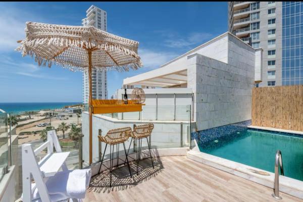 A la foto es mostra l'objecte sea view Vila-5BDR situat a la ciutat de Netanya.