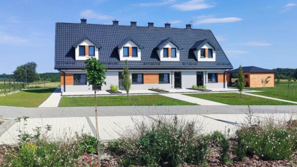 På bildet vises objektet Apartamenty Szepty Mazur som ligger i byen Bielskie.