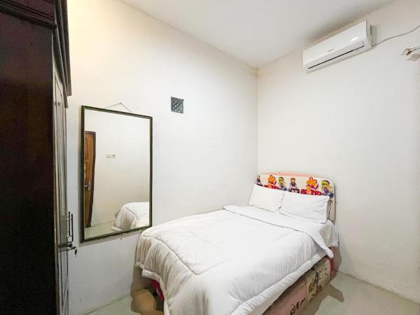 En la foto se muestra el objeto Oma Kost 3 Probolinggo Mitra RedDoorz ubicado en la ciudad de Pohsangit-kidul.