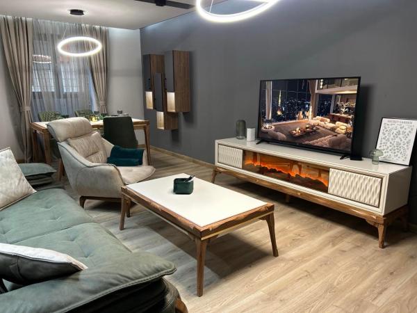 The photo shows the Green Paradise - Luxurious Apartments located in the city of Trud.