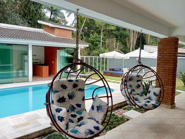 På billedet ses objektet Casa de Praia Luxo e Conforto beliggende i byen Bertioga.