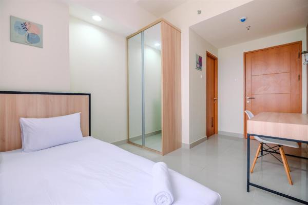 Bild 7: Nice 2BR at 26th Floor Evenciio Margonda Apartment By Travelio