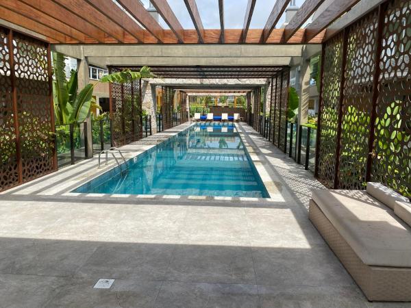 På billedet ses objektet Apartamento em Condomínio Clube frente à praia do Campeche beliggende i byen Florianópolis.