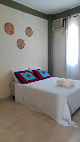 A la foto es mostra l'objecte Casa de veraneio em guarapari situat a la ciutat de Guarapari.