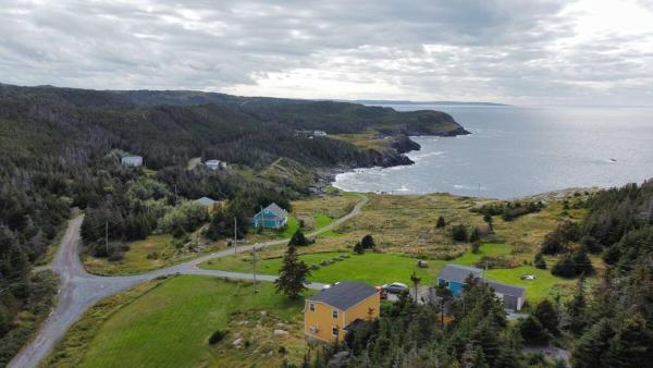 A la foto es mostra l'objecte The Howard House Daniels Cove situat a la ciutat de Trinity.
