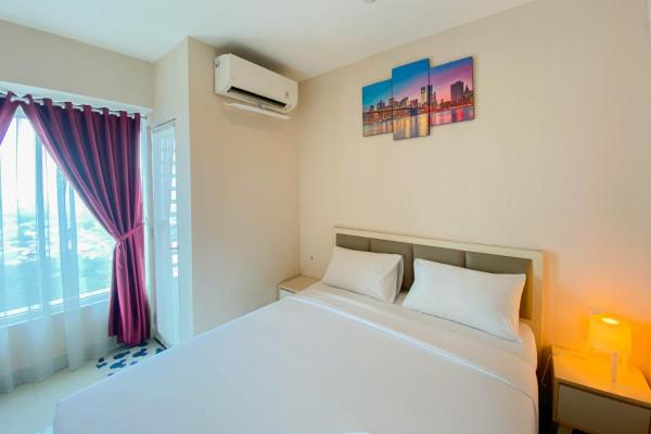 La photo montre l'objet Cozy 1BR without Living Room Grand Kamala Lagoon Apartment By Travelio situé dans la ville de Bekasi.