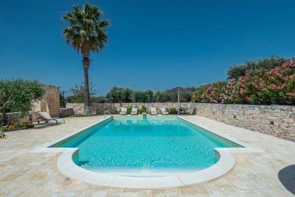 Op de foto is het object Villa Oasi dei Trulli by MMega te zien, gelegen in de stad Santa Lucia.