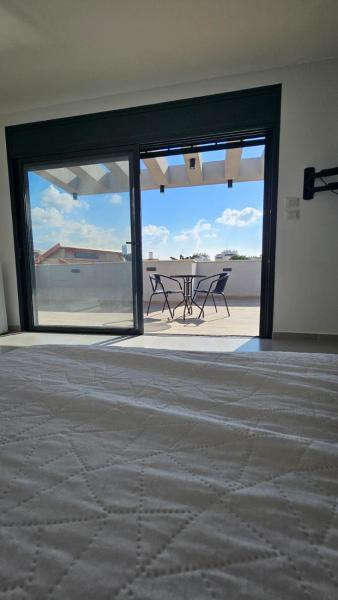 Nella foto è visibile l'oggetto B&B Amit 15 minutes from the airport - אירוח כפרי עמית 15 דקות משדה תעופה situato nella città di Rosh Ha‘Ayin.