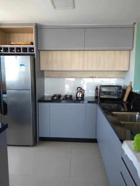 A la foto es mostra l'objecte Amplo apartamento em Torres - 4 dormitórios situat a la ciutat de Torres.