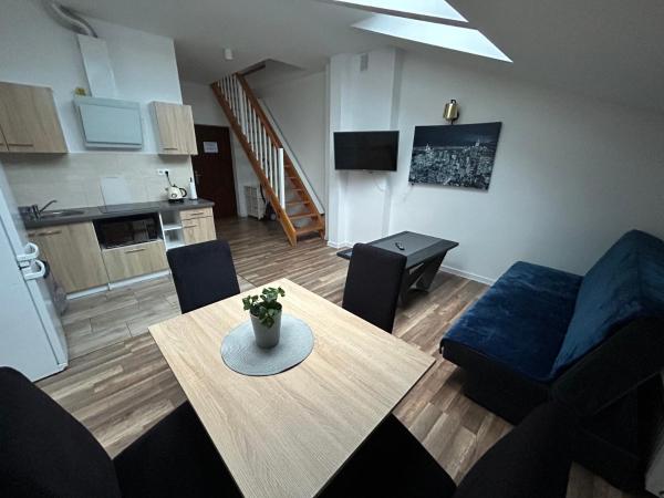 Na zdjęciu widoczny jest obiekt Apartamenty aleja ducha świętego Apartament 4 położony w mieście Partynia.