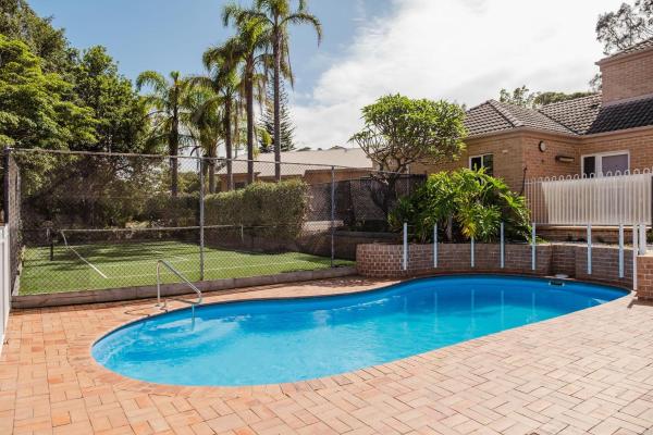 Foto 7: Sunset Poolside - Pool, Wi-Fi, Tennis Court, Walk to the Beach!