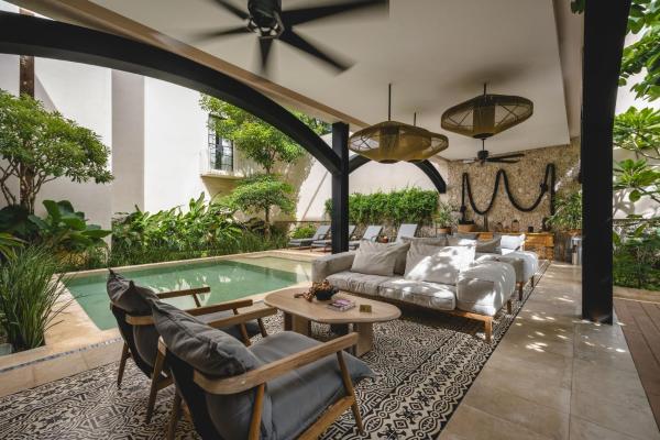 A la foto es mostra l'objecte Adoro Hotel Boutique situat a la ciutat de Mérida.