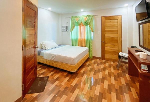 På billedet ses objektet RedDoorz @ 4ks Pension House Bogo City Cebu beliggende i byen Tabogon.