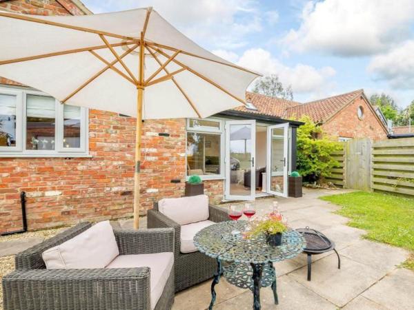 A la foto es mostra l'objecte Cosy Cottage - Rural Location Near SkegnessCottage situat a la ciutat de Croft.