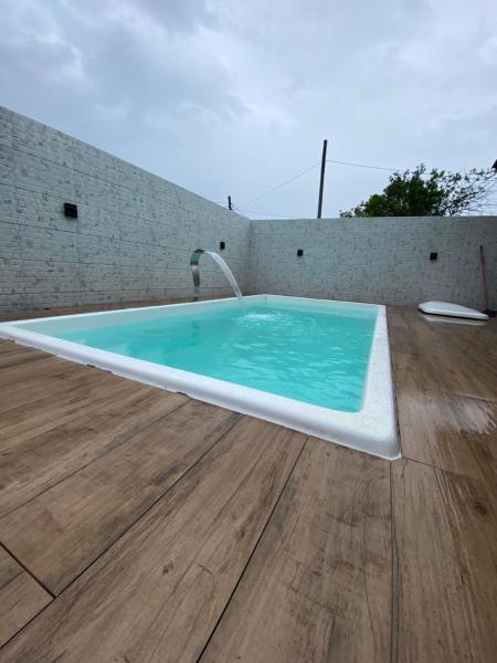 A la foto es mostra l'objecte Casa de praia situat a la ciutat de Palhoça.