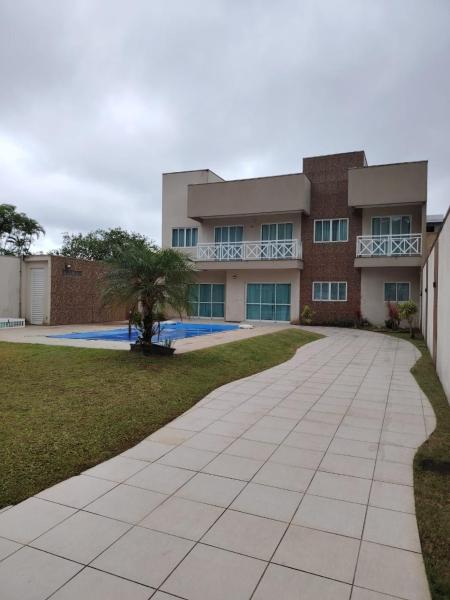A la foto es mostra l'objecte Casa com piscina em Caiobá a poucos metros da praia brava situat a la ciutat de Caiobá.