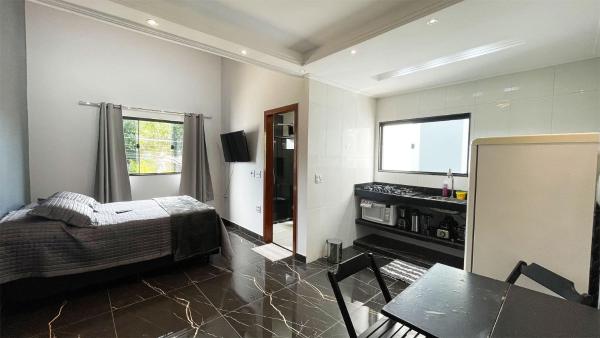 En la foto se muestra el objeto The Férias | Loft c/ cozinha, localizado no portico de Búzios ubicado en la ciudad de Búzios.