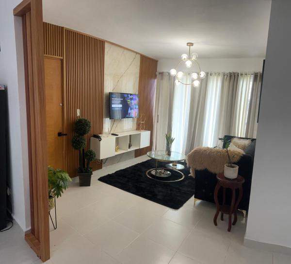 写真にはLa Ceibita市にあるHermoso y amplio apartamento de 3 habitaciones y 2 baños !が写っています。