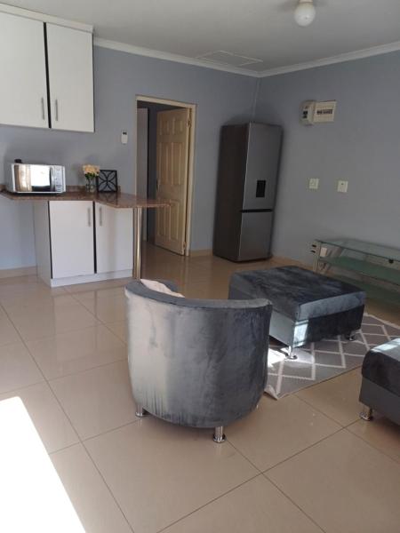 The photo shows the M-series Holiday Accommodation located in the city of Queensburgh.