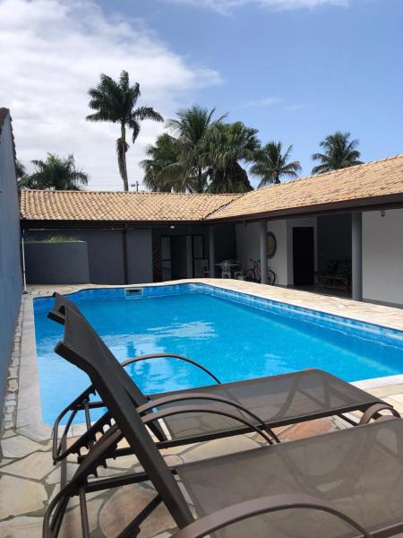 På billedet ses objektet Casa Maldonado Morada da Praia 4 suítes beliggende i byen Bertioga.