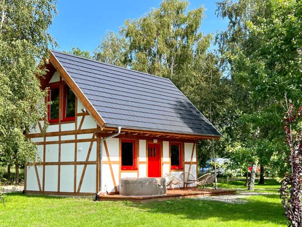 A la foto es mostra l'objecte Casa de Rowosz - domki i apartamenty nad morzem situat a la ciutat de Rowy.