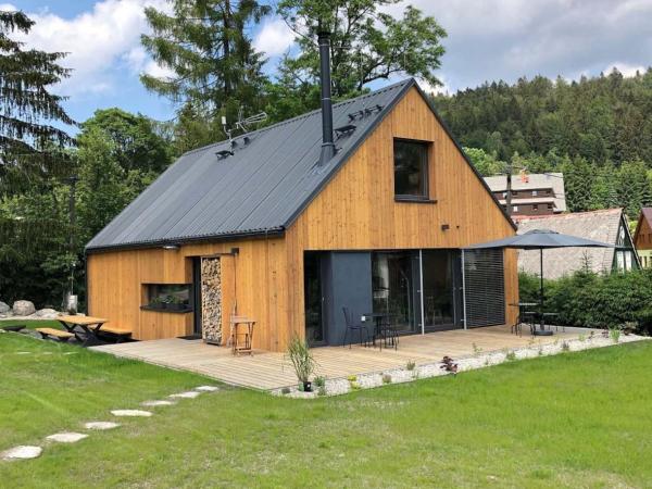 The photo shows the Villa in Bohemia with barbecue located in the city of Bedřichov.