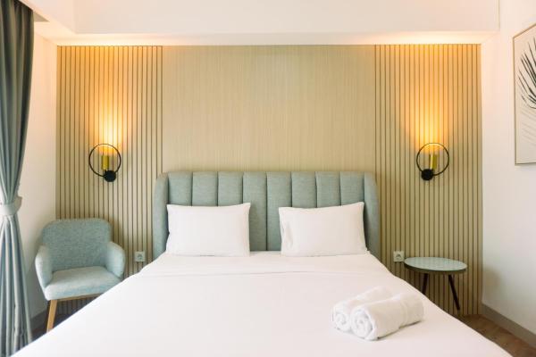 På bilden syns objektet Well Furnished and Elegant 1BR at Bintaro Embarcadero Apartment By Travelio som ligger i staden Pondokpucung.