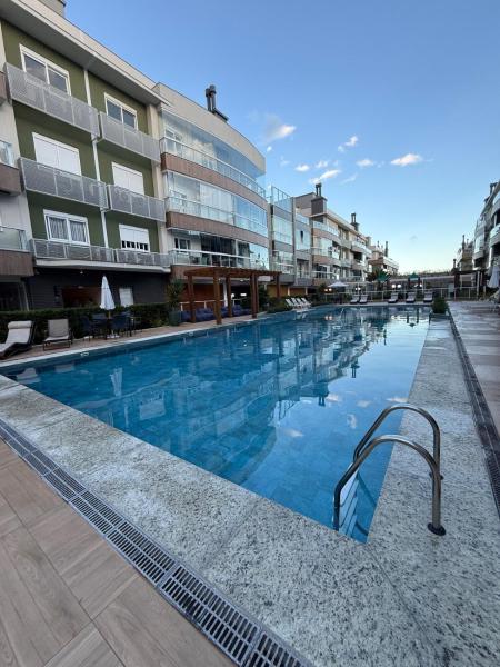 På billedet ses objektet Sunclub condomínio novíssimo frente mar beliggende i byen Florianópolis.