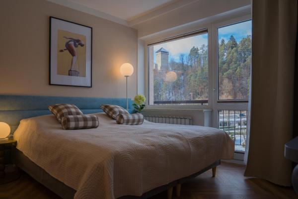 Na fotografii je vidět objekt Villa Turris Apartamenty przy Muszyńskim Zamku nacházející se ve městě Muszyna.