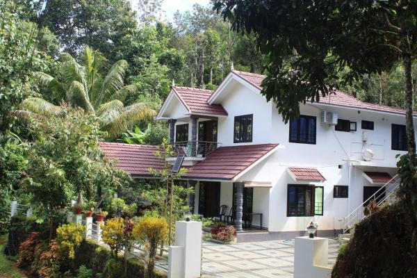 Nella foto è visibile l'oggetto Munnar Village Homes situato nella città di Munnar.