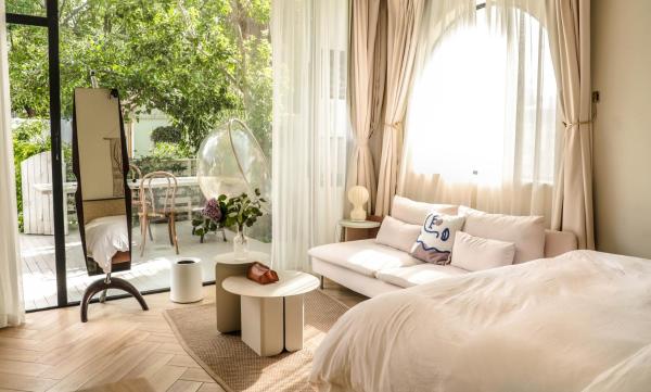 Foto 6: 不觉晓晨曦花园别墅 Bujuexiao Dawn Garden Villa Shanghai - Free daily shuttle bus to Disneyland, exquisite and beautiful garden courtyard, private spa bathtub in each room, hearty daily breakfast provided for all guests