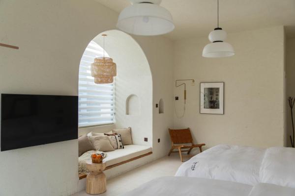 Habitació Familiar amb Vistes al Jardí — 45 m² - 不觉晓晨曦花园别墅 Bujuexiao Dawn Garden Villa Shanghai - Free daily shuttle bus to Disneyland, exquisite and beautiful garden courtyard, private spa bathtub in each room, hearty daily breakfast provided for all guests