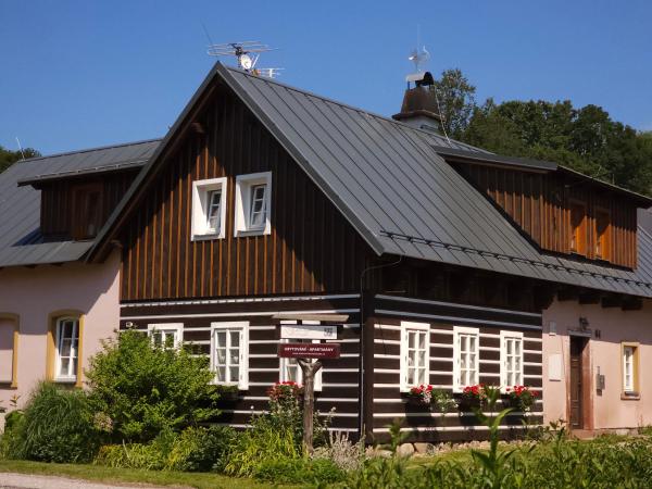 A la foto es mostra l'objecte Krkonošská chaloupka situat a la ciutat de Černý Dŭl.