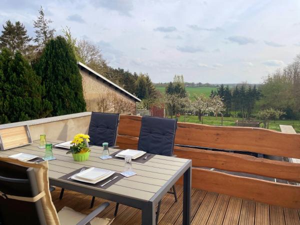 Na foto é possível ver o objeto Ferienwohnung Pfotenglück nahe Ostsee mit atemberaubender Dachterrasse & Gartenblick localizado na cidade de Gostorf.
