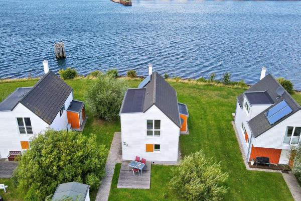 A la foto es mostra l'objecte Ferienhaus-An-der-Ostsee-by-Seeblick-Ferien-ORO-direkte-Wasserlage-Sauna-E-Saeule situat a la ciutat de Olpenitz.