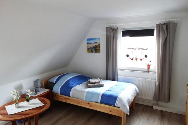 A la foto es mostra l'objecte Haus Holo für Monteure - 4 Einzelzimmer - 5 Betten -2 Bäder - Küche situat a la ciutat de Peissen.