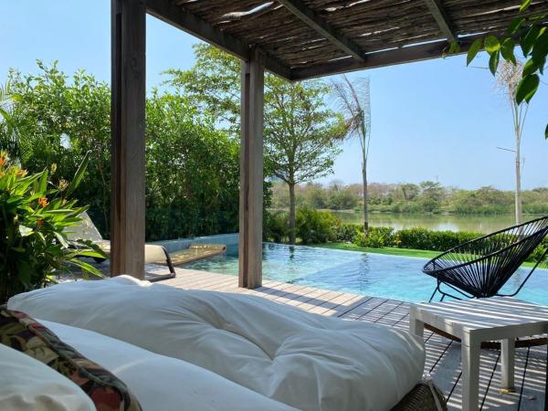 照片显示了位于Punta Canoas市的Hermosa casa en Karibana Ctg物件。