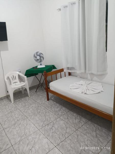 A la foto es mostra l'objecte pinheiral apart kitnet mobiliado situat a la ciutat de Pinheiral.
