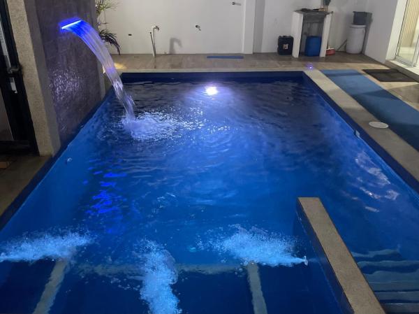 A la foto es mostra l'objecte Vacacional casa con piscina privada situat a la ciutat de Manta.