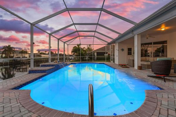 Foto 2: Gulf Access, Dock with Tiki, Heated Pool & Pool Table - Mango Paradise-Roelens