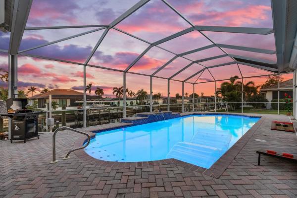 Foto 5: Gulf Access, Dock with Tiki, Heated Pool & Pool Table - Mango Paradise-Roelens
