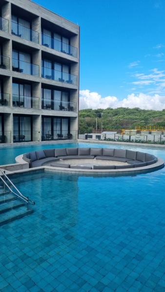 Na fotografii je vidět objekt Flat Recanto Muro Alto - Porto de Galinhas nacházející se ve městě Ipojuca.