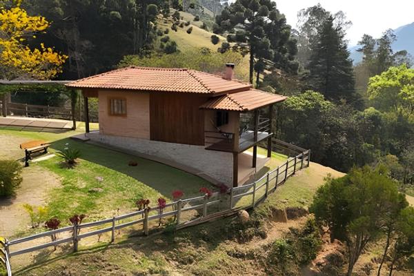 Nella foto è visibile l'oggetto Chalé Recanto da Mantiqueira situato nella città di Gonçalves.