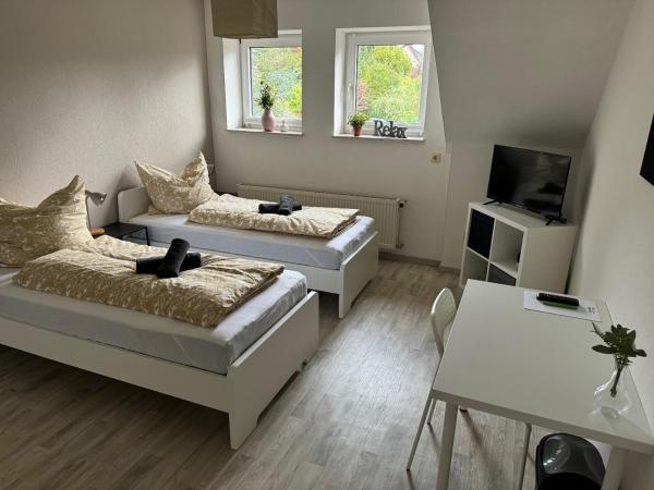 Na zdjęciu widoczny jest obiekt Pension Platzhirsch 2 położony w mieście Wingerode.