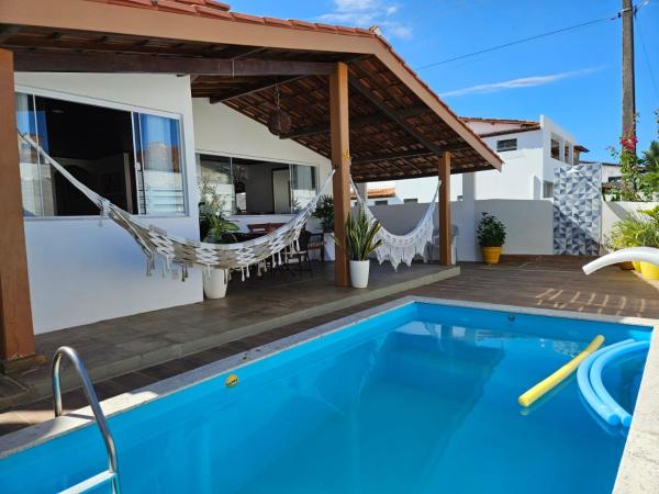 Na zdjęciu widoczny jest obiekt Casa confortável położony w mieście Camaçari.